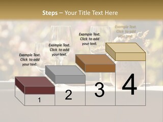 A Table Topped With Two Wine Glasses And A Vase Filled With Flowers PowerPoint Template