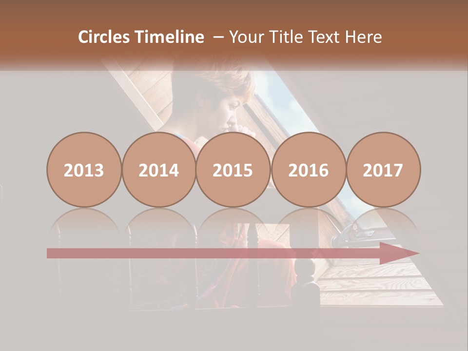 A Woman Sitting On A Bed Looking Out Of A Window PowerPoint Template