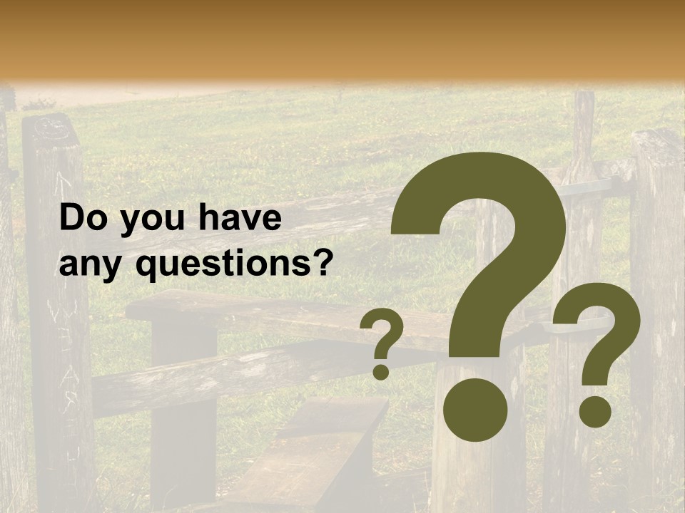 A Wooden Bench Sitting On Top Of A Lush Green Field PowerPoint Template