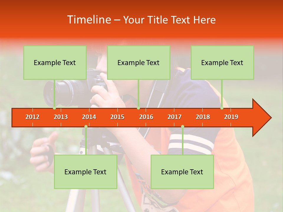 A Young Boy Taking A Picture With A Camera PowerPoint Template