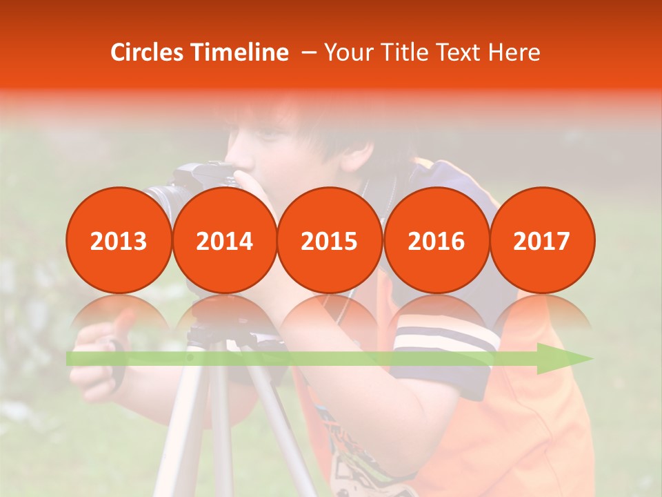 A Young Boy Taking A Picture With A Camera PowerPoint Template