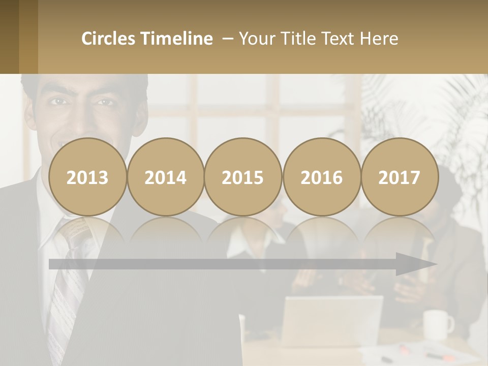 A Man In A Suit Standing In Front Of A Group Of People PowerPoint Template