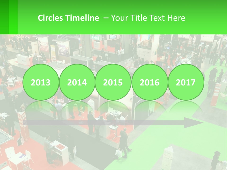 A Large Group Of People Standing Around A Booth PowerPoint Template