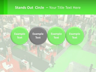 A Large Group Of People Standing Around A Booth PowerPoint Template