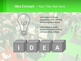 A Large Group Of People Standing Around A Booth PowerPoint Template