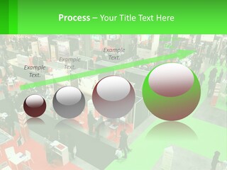 A Large Group Of People Standing Around A Booth PowerPoint Template