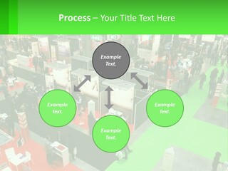 A Large Group Of People Standing Around A Booth PowerPoint Template