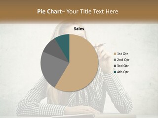 A Woman Sitting At A Table With A Pen In Her Mouth PowerPoint Template