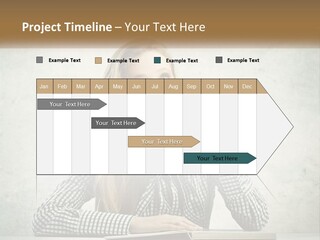 A Woman Sitting At A Table With A Pen In Her Mouth PowerPoint Template