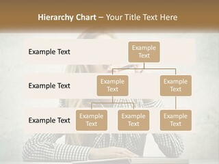 A Woman Sitting At A Table With A Pen In Her Mouth PowerPoint Template
