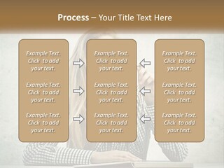 A Woman Sitting At A Table With A Pen In Her Mouth PowerPoint Template
