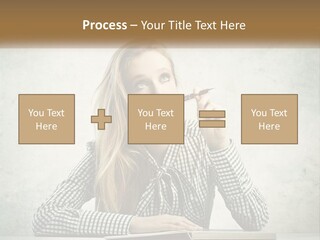A Woman Sitting At A Table With A Pen In Her Mouth PowerPoint Template
