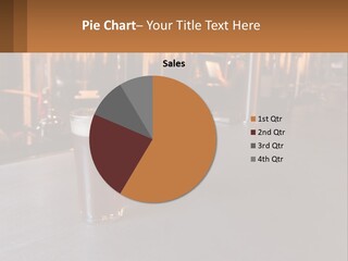 A Glass Of Beer Sitting On A Bar PowerPoint Template