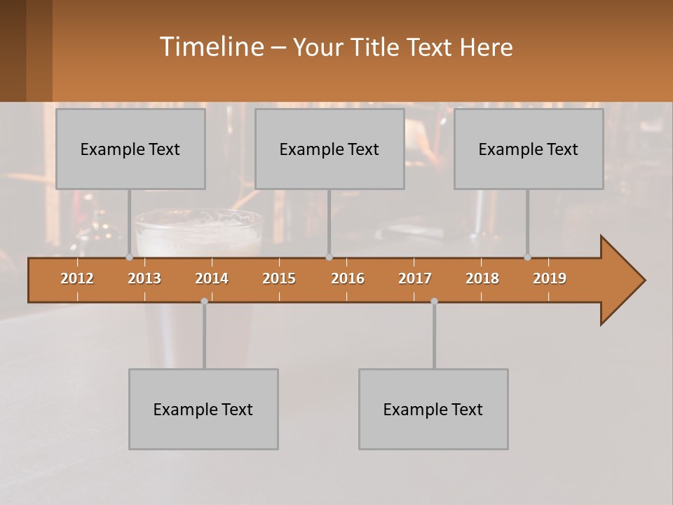 A Glass Of Beer Sitting On A Bar PowerPoint Template