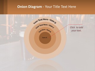 A Glass Of Beer Sitting On A Bar PowerPoint Template