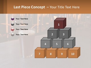 A Glass Of Beer Sitting On A Bar PowerPoint Template