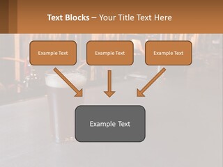 A Glass Of Beer Sitting On A Bar PowerPoint Template