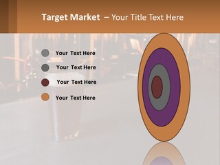 A Glass Of Beer Sitting On A Bar PowerPoint Template
