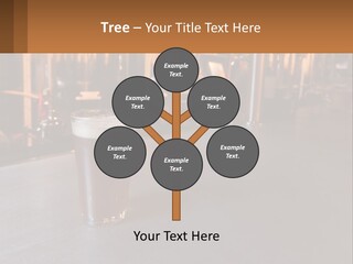 A Glass Of Beer Sitting On A Bar PowerPoint Template