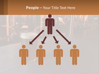 A Glass Of Beer Sitting On A Bar PowerPoint Template