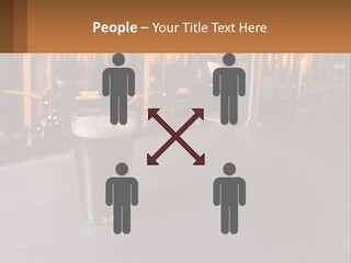 A Glass Of Beer Sitting On A Bar PowerPoint Template