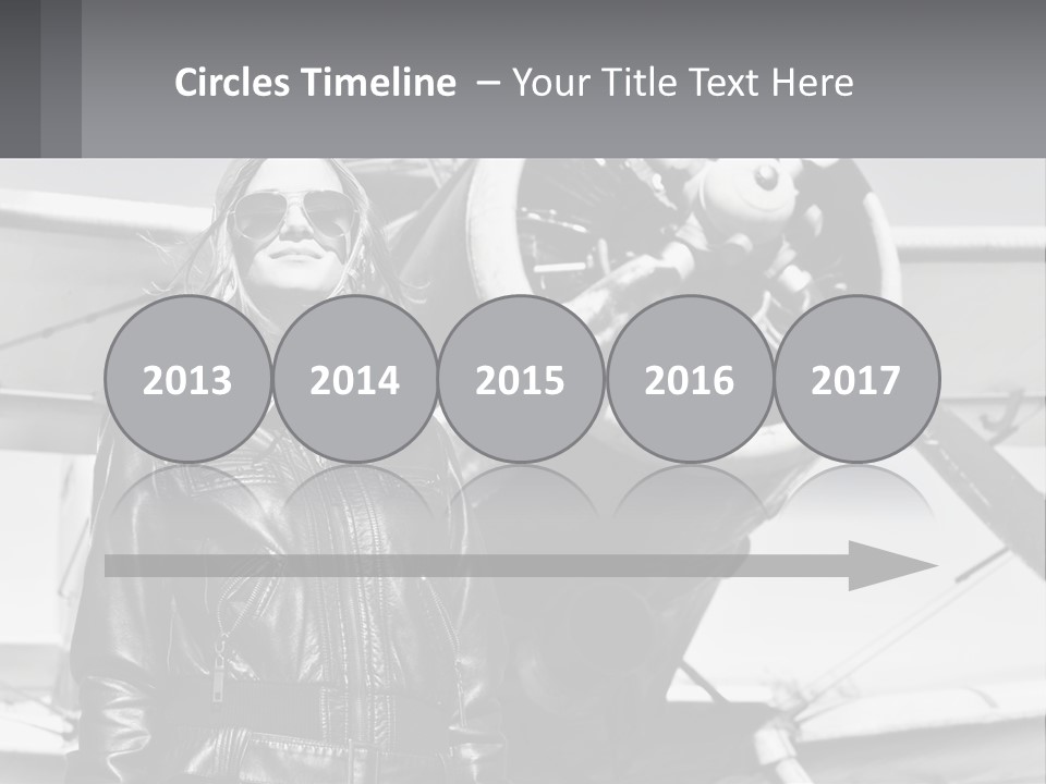 A Woman Standing In Front Of An Airplane PowerPoint Template