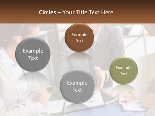 A Group Of People Sitting Around A Table Talking PowerPoint Template
