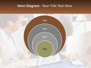 A Group Of People Sitting Around A Table Talking PowerPoint Template