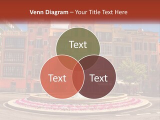 A Fountain In Front Of A Row Of Multi - Colored Buildings PowerPoint Template