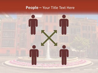 A Fountain In Front Of A Row Of Multi - Colored Buildings PowerPoint Template