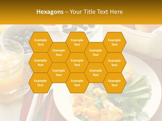 A Plate Of Food On A Table With A Glass Of Orange Juice PowerPoint Template