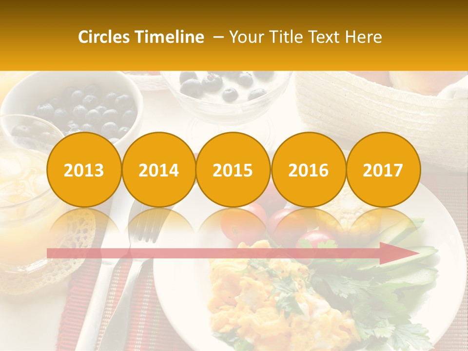 A Plate Of Food On A Table With A Glass Of Orange Juice PowerPoint Template
