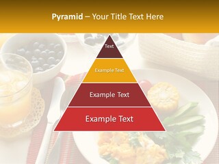 A Plate Of Food On A Table With A Glass Of Orange Juice PowerPoint Template