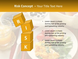 A Plate Of Food On A Table With A Glass Of Orange Juice PowerPoint Template