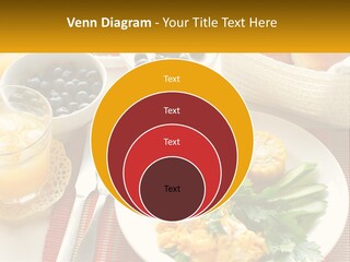 A Plate Of Food On A Table With A Glass Of Orange Juice PowerPoint Template