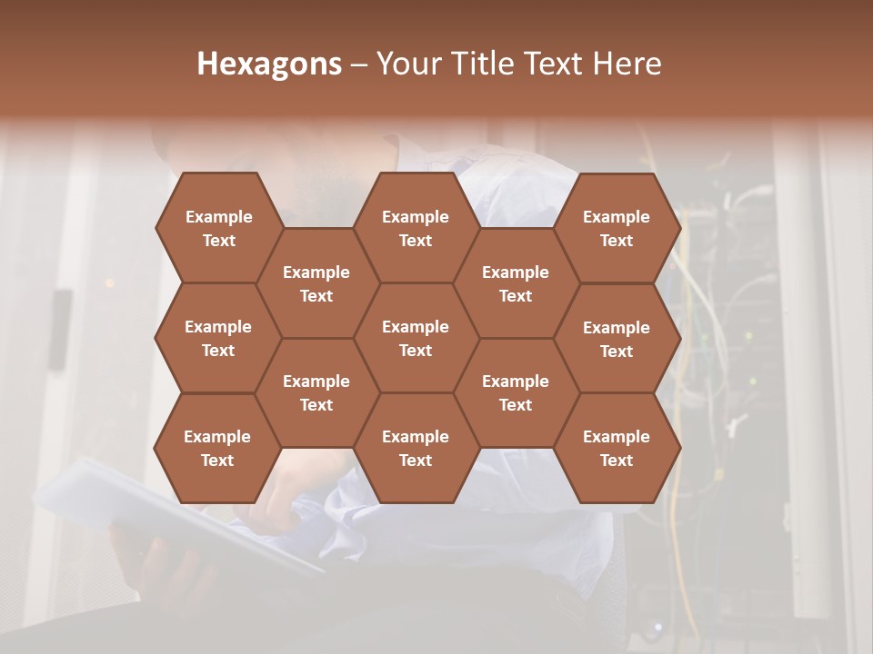 A Man Sitting In Front Of A Server In A Server Room PowerPoint Template