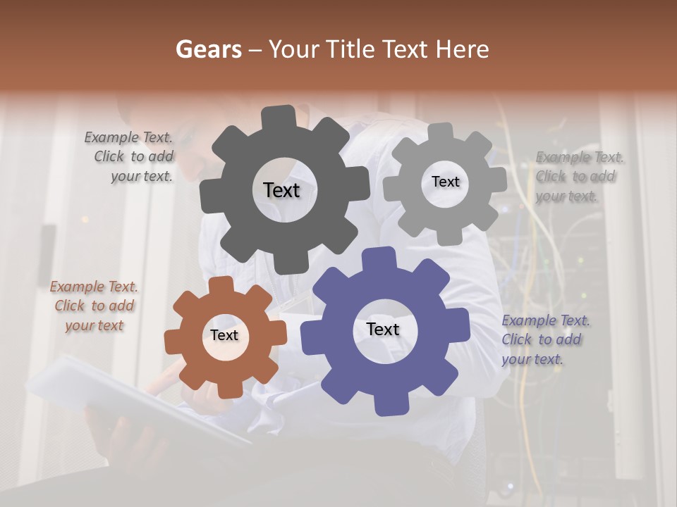 A Man Sitting In Front Of A Server In A Server Room PowerPoint Template