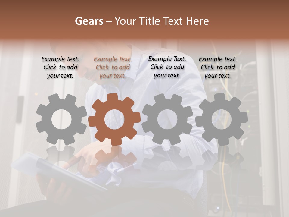 A Man Sitting In Front Of A Server In A Server Room PowerPoint Template