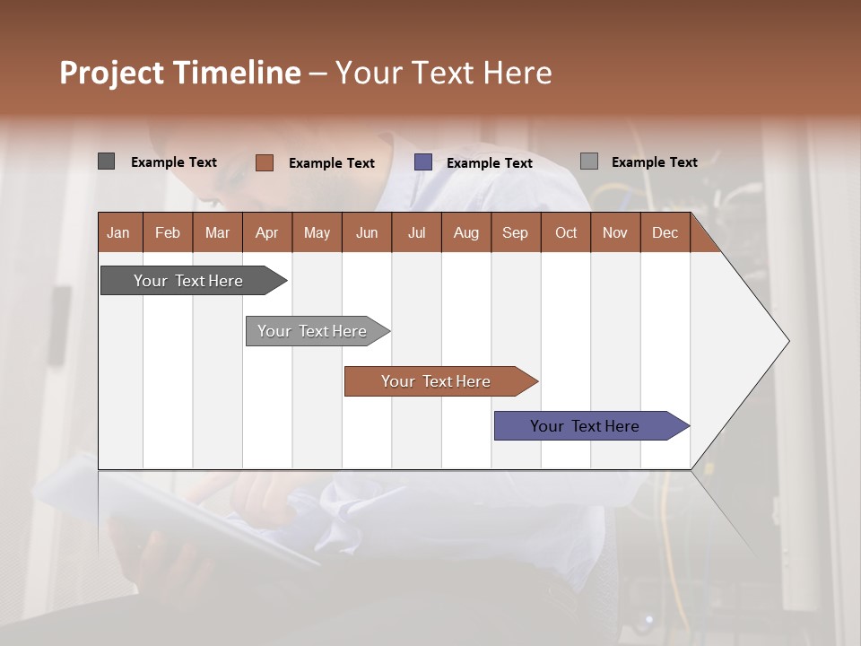 A Man Sitting In Front Of A Server In A Server Room PowerPoint Template