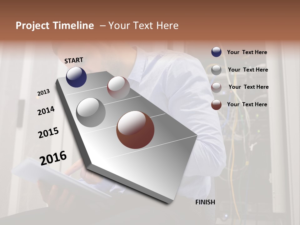 A Man Sitting In Front Of A Server In A Server Room PowerPoint Template