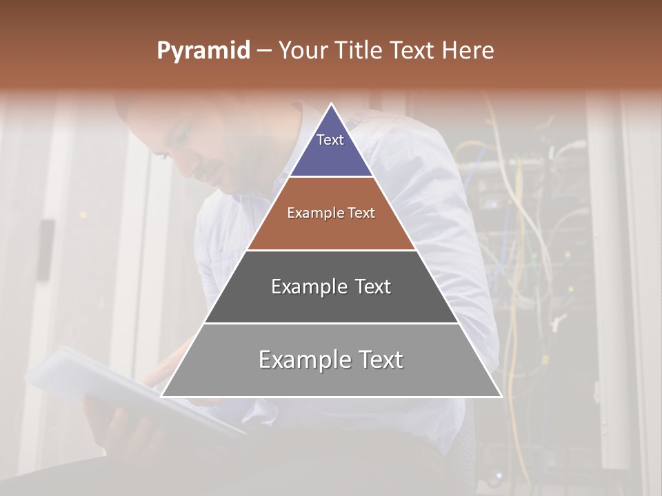 A Man Sitting In Front Of A Server In A Server Room PowerPoint Template
