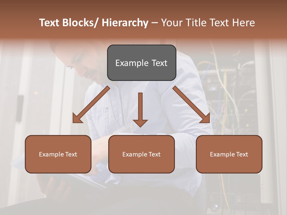 A Man Sitting In Front Of A Server In A Server Room PowerPoint Template
