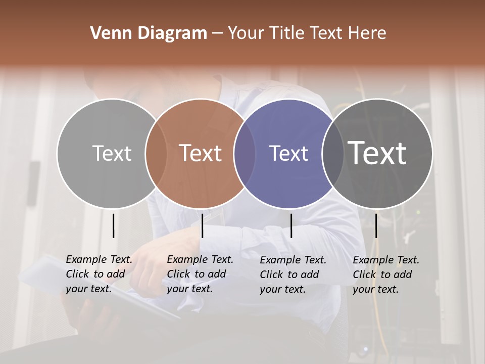 A Man Sitting In Front Of A Server In A Server Room PowerPoint Template