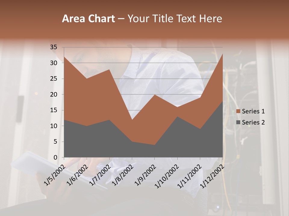 A Man Sitting In Front Of A Server In A Server Room PowerPoint Template
