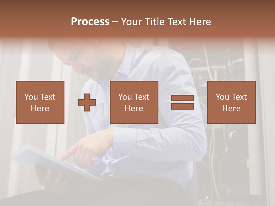 A Man Sitting In Front Of A Server In A Server Room PowerPoint Template