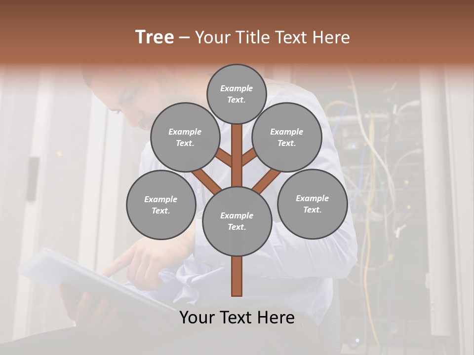 A Man Sitting In Front Of A Server In A Server Room PowerPoint Template