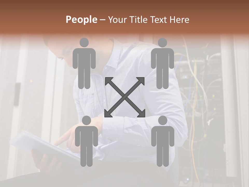 A Man Sitting In Front Of A Server In A Server Room PowerPoint Template