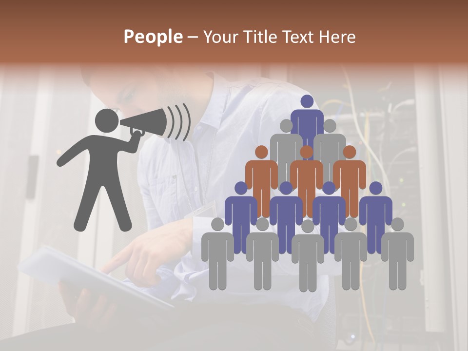 A Man Sitting In Front Of A Server In A Server Room PowerPoint Template