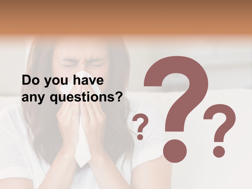 A Woman Blowing Her Nose While Sitting On A Couch PowerPoint Template