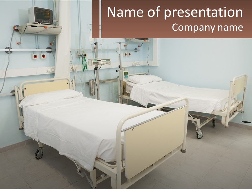 A Hospital Room With Two Beds And A Monitor PowerPoint Template